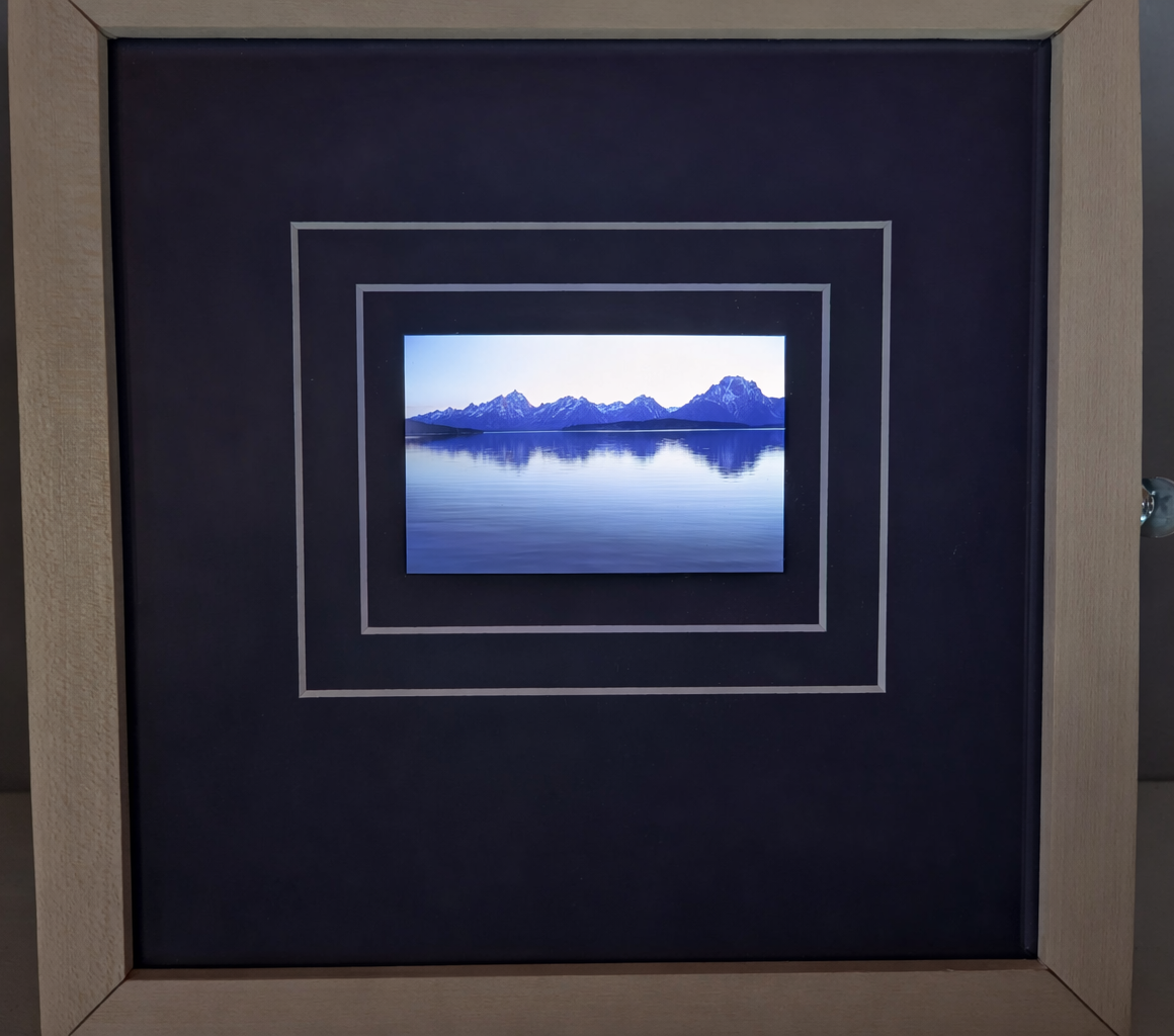 Custom illuminated photo box by Trae Lower